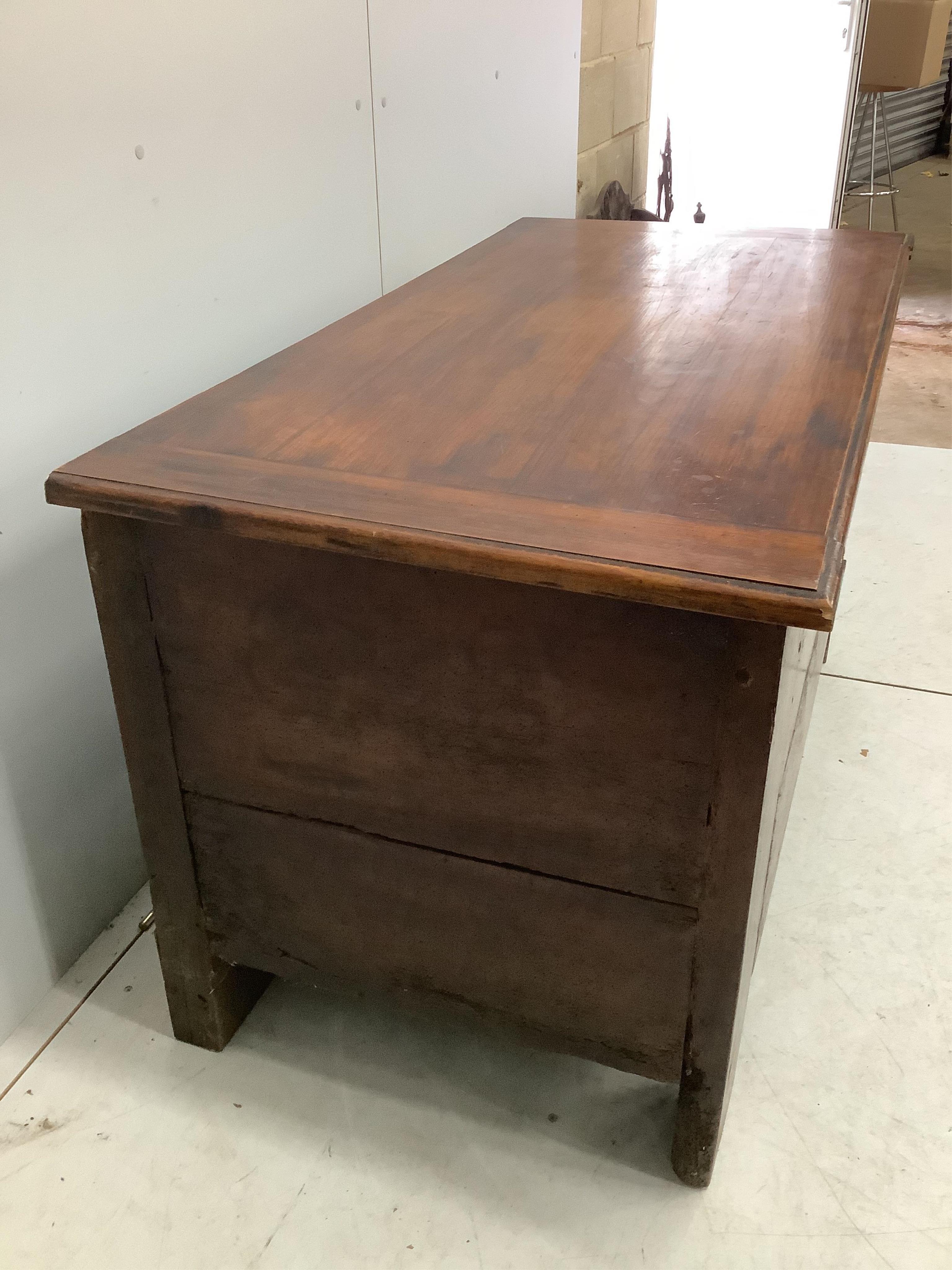 An 18th century and later French oak and fruit wood coffer, width 129cm, depth 65cm, height 71cm. Condition - fair, with later top